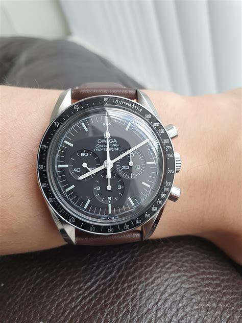 omega speedmaster on the wrist|Omega Speedmaster wrist watch.